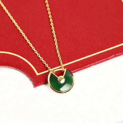 [BIJOUX]COLLIER AMULETTE OR MALACHITE