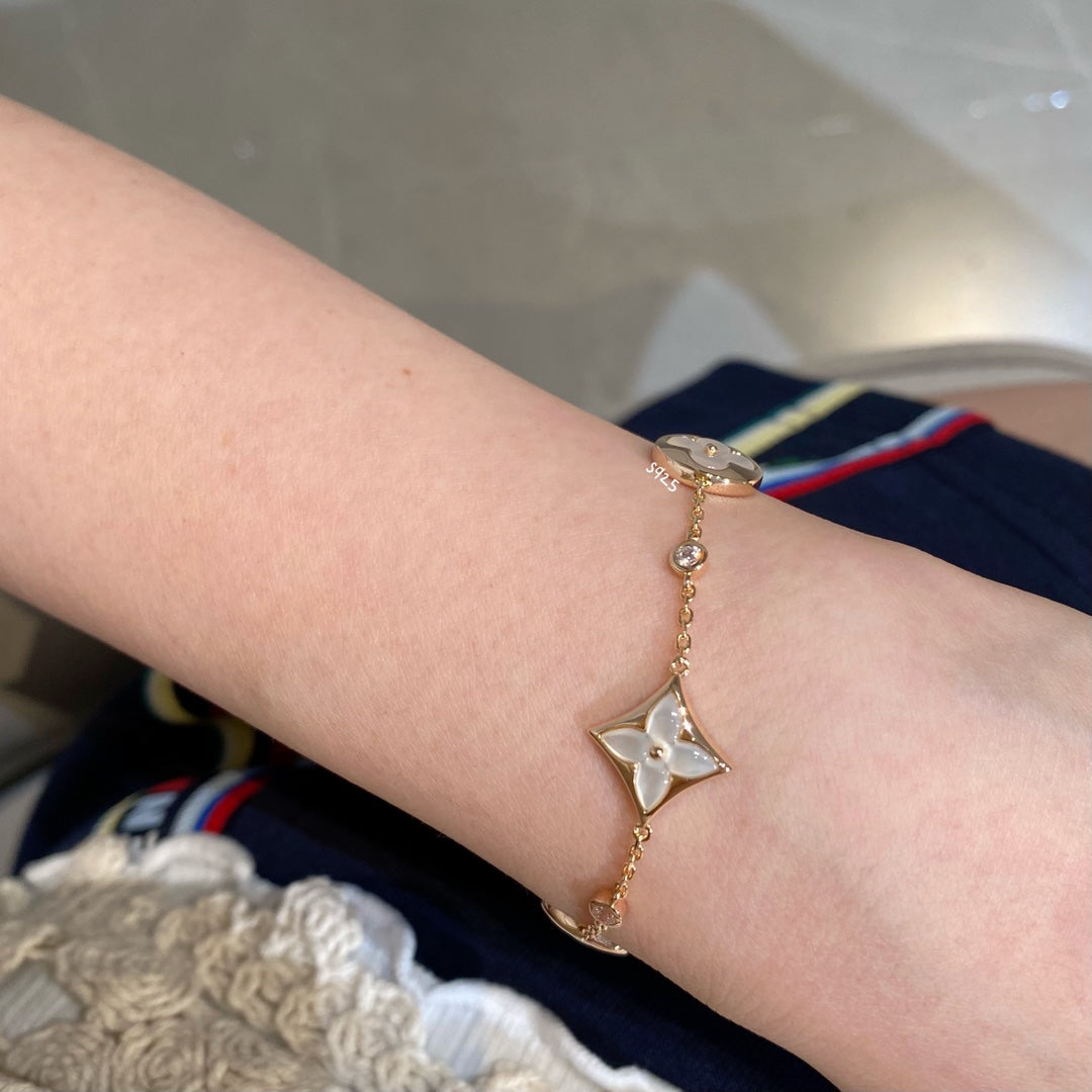 [BIJOUX]STAR AND SUN 4 MOTIF WHITE MOP PINK GOLD BRACELET