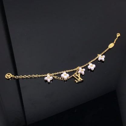 [BIJOUX]BRACELET EN OR 6 MOTIFS ÉTOILE ET SOLEIL