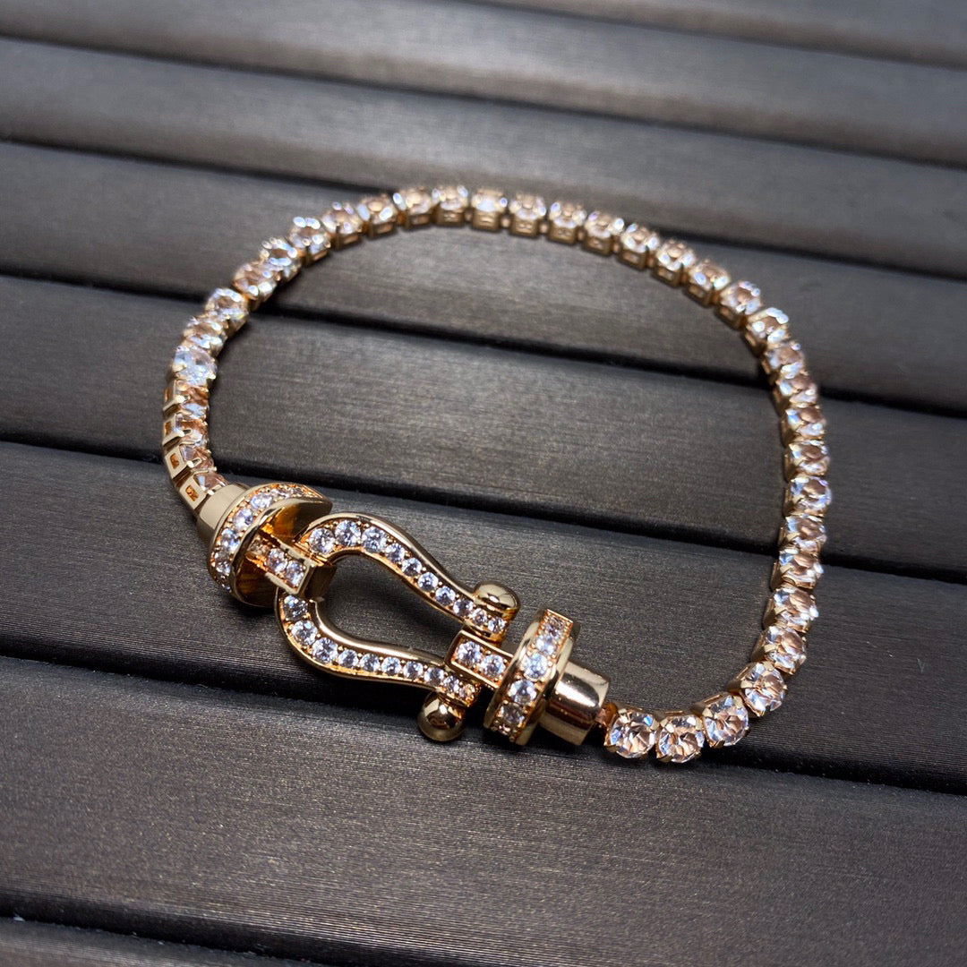 [BIJOUX]BRACELET TENNIS FORCE LARGE FER A CHEVAL FULL DIAMOND