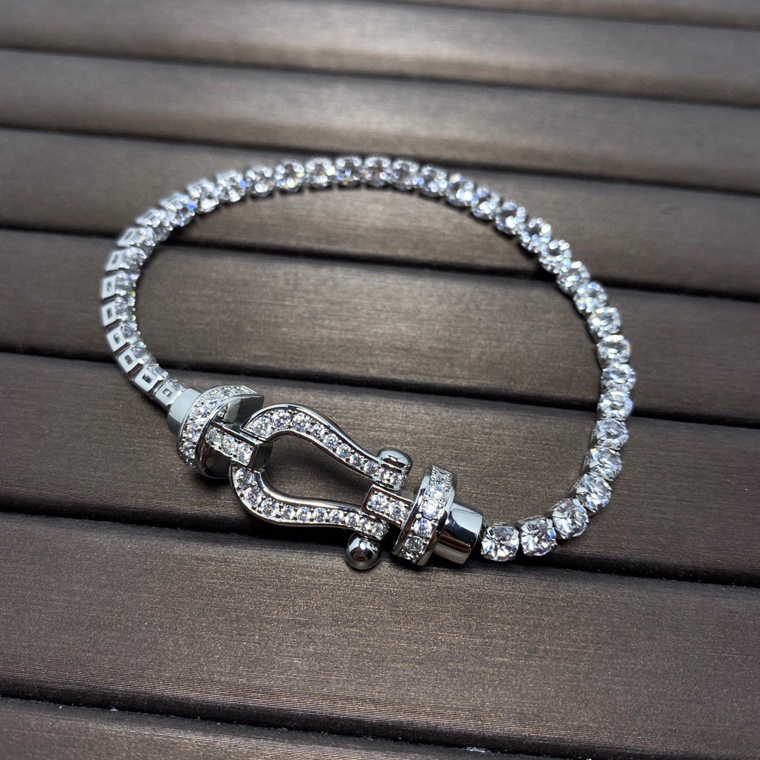 [BIJOUX]BRACELET TENNIS FORCE LARGE FER A CHEVAL FULL DIAMOND