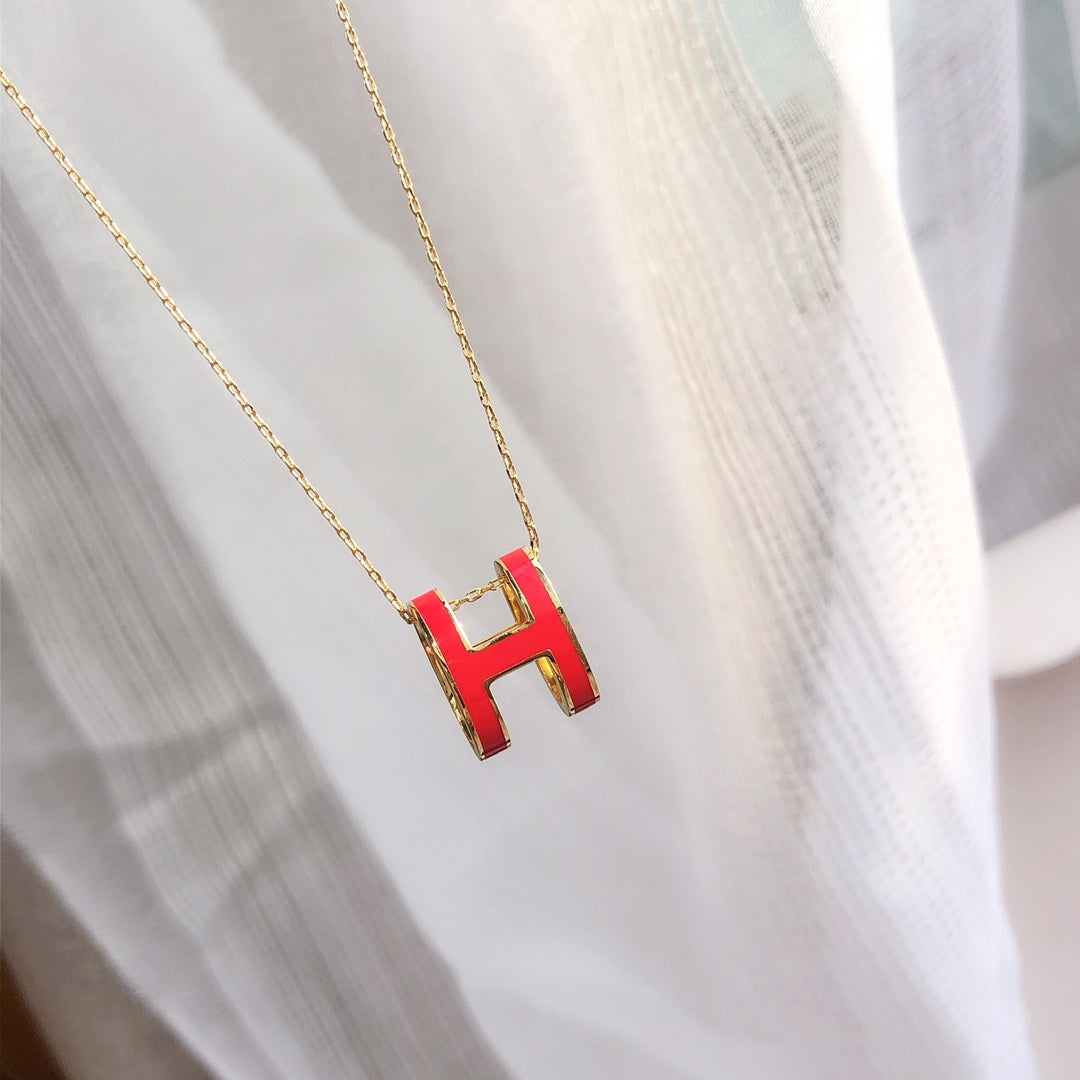 [BIJOUX] COLLIER HM CLIC EN OR EMAIL ROUGE