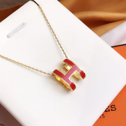 [BIJOUX] COLLIER HM CLIC EN OR EMAIL ROUGE