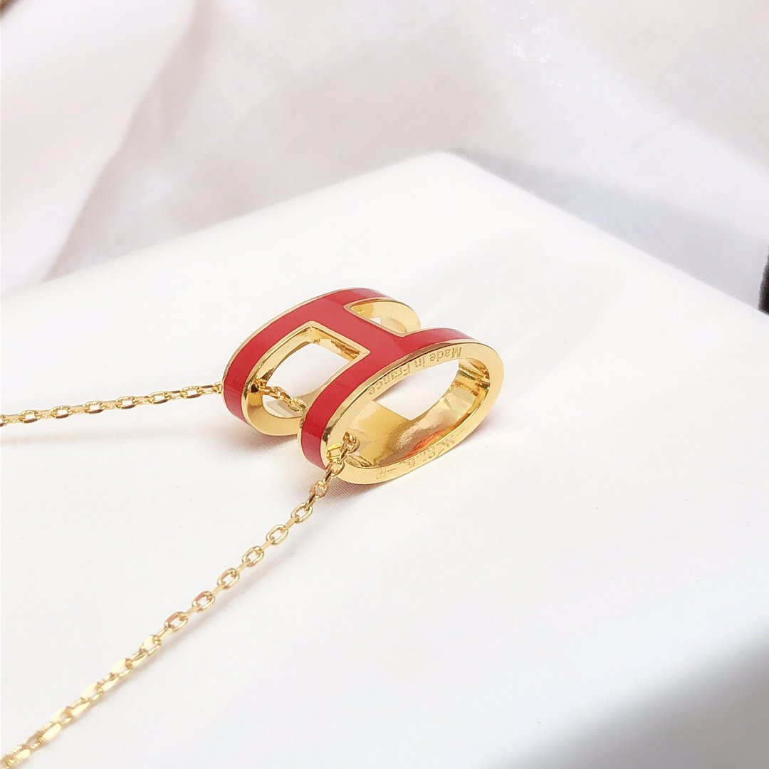 [BIJOUX] COLLIER HM CLIC EN OR EMAIL ROUGE