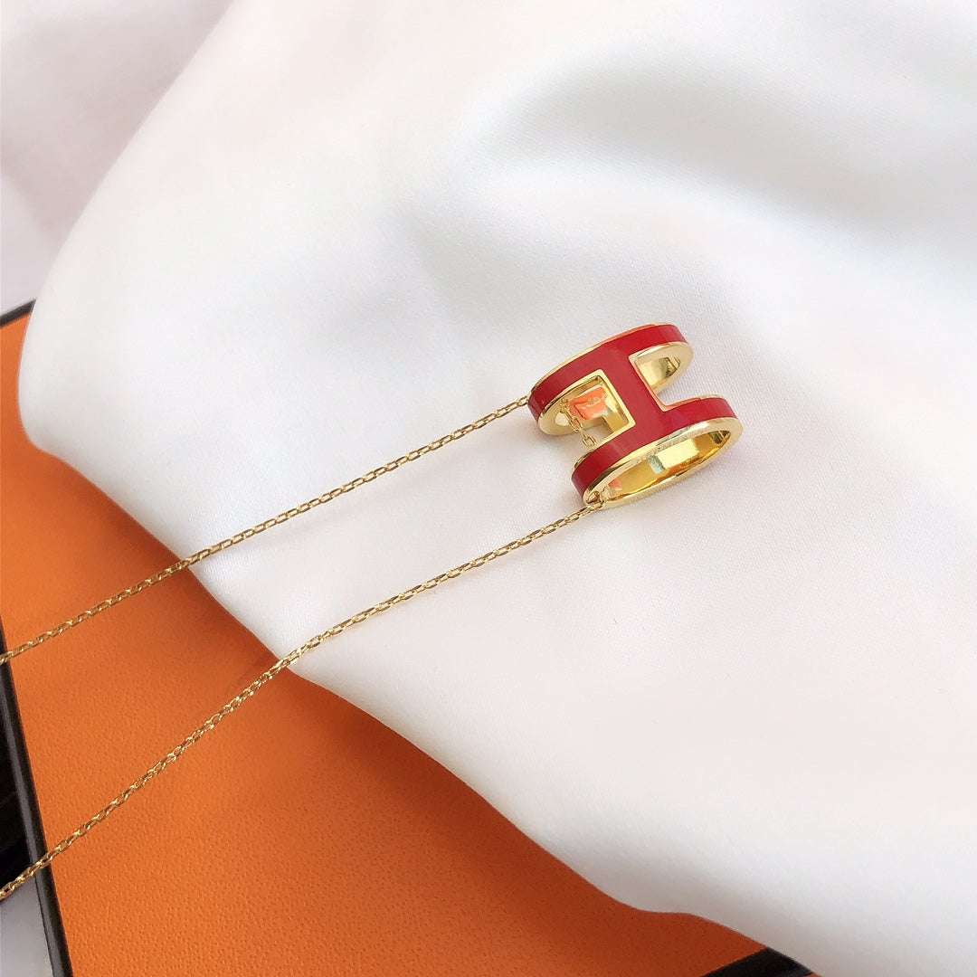 [BIJOUX] COLLIER HM CLIC EN OR EMAIL ROUGE