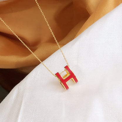 [BIJOUX] COLLIER HM CLIC EN OR EMAIL ROUGE