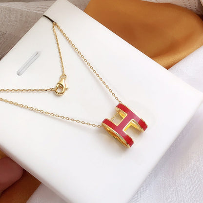 [BIJOUX] COLLIER HM CLIC EN OR EMAIL ROUGE