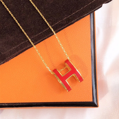 [BIJOUX] COLLIER HM CLIC EN OR EMAIL ROUGE